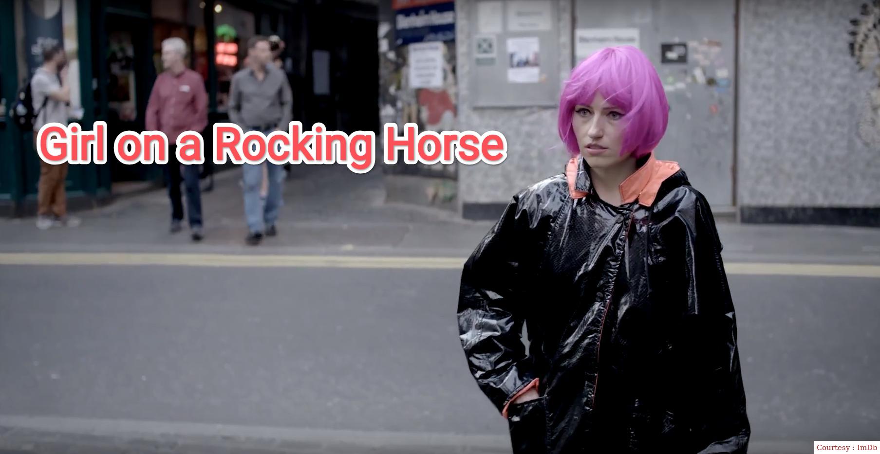 Girl on a Rocking Horse