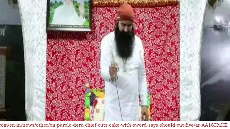 Gurmeet Ram Rahim out on parole cuts a giant cake with sword