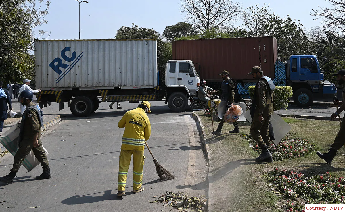 Imran Khan's supporters keep shipping containers outside his house