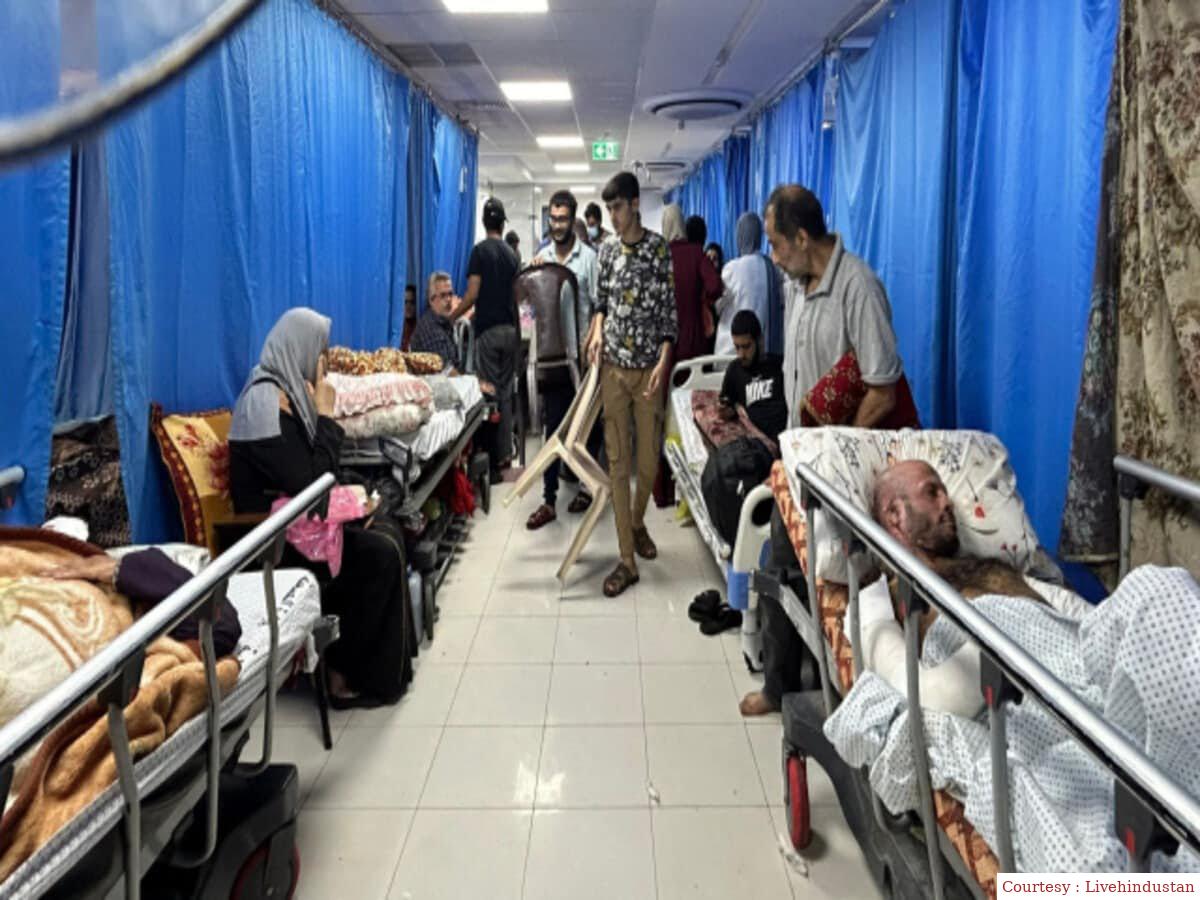 Patients carrying white flags from Al Shifa Hospital