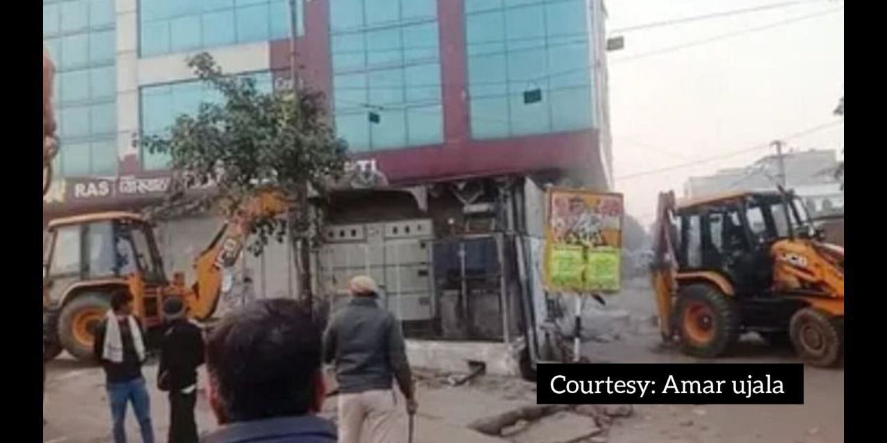 The JDA Enforcement Team runs a bulldozer at the learning coaching institute.