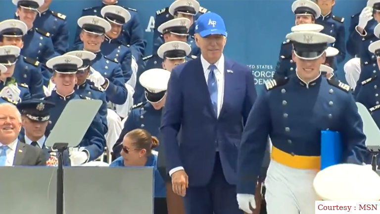 President Biden trips over an obstacle at Air Force Academy in Colorado