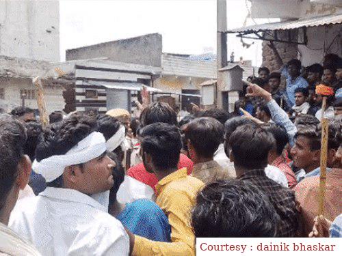 A ruckus in a government school due to mixing urine in water bottle and getting a slip written in the bag.
