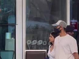 Siddhant Chaturvedi and Navya Nanda twining in white at the airport
