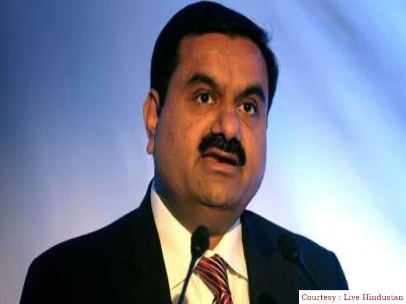 The Adani Group involved in the race to buy a cement company is struggling with debt problems.