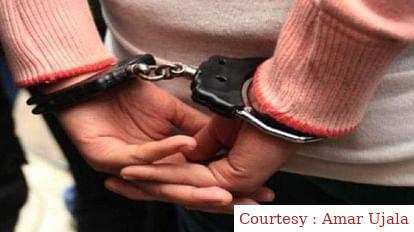 Two Indian employees who were accused of bribery in Singapore.