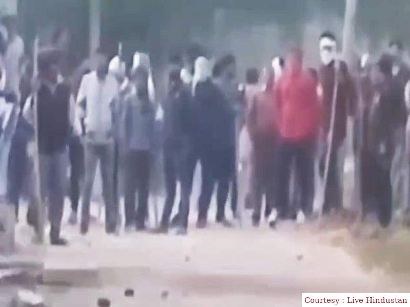 Violence took place amid voting, stone pelting in two groups.