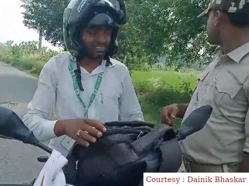 गोपालगंज : स्वास्थ्यकर्मी के भेष में शराब तस्कर देसी शराब के साथ गिरफ्तार।